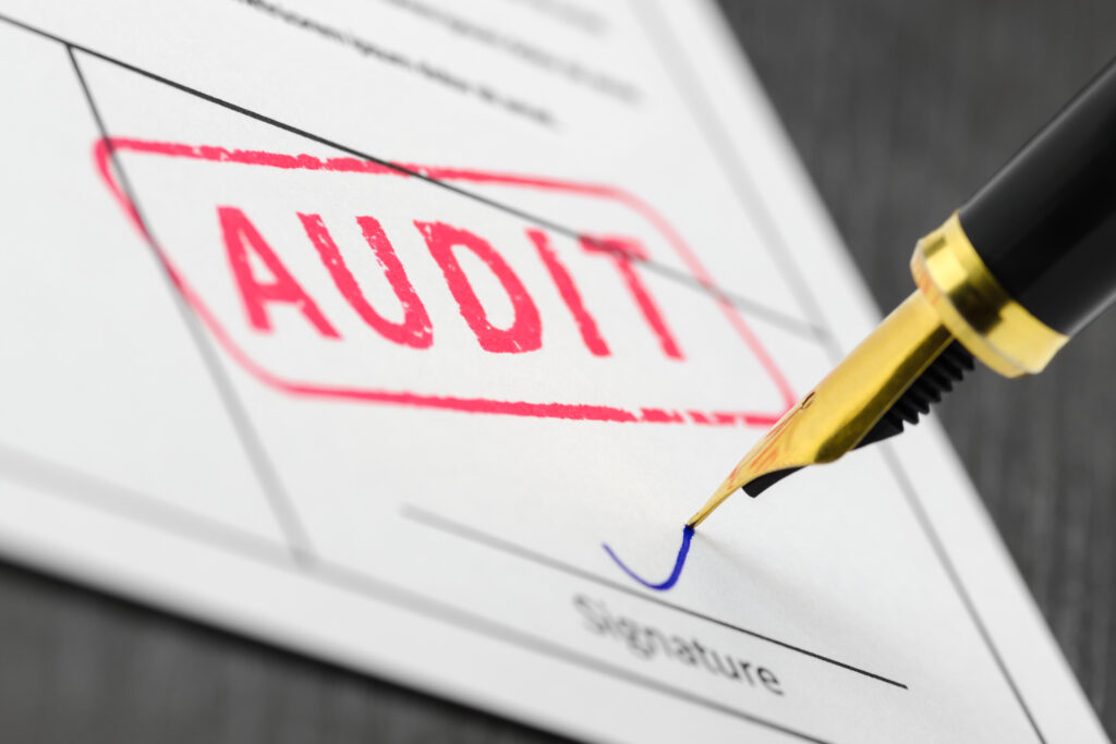 Single audits signature form close up with a stamp that says audit