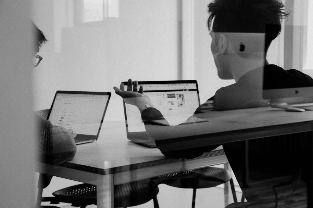 Man at a laptop reviewing top small public accounting firms in his area