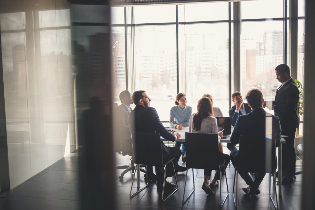 A group of business people discussing the documents needed for compilation and review engagements