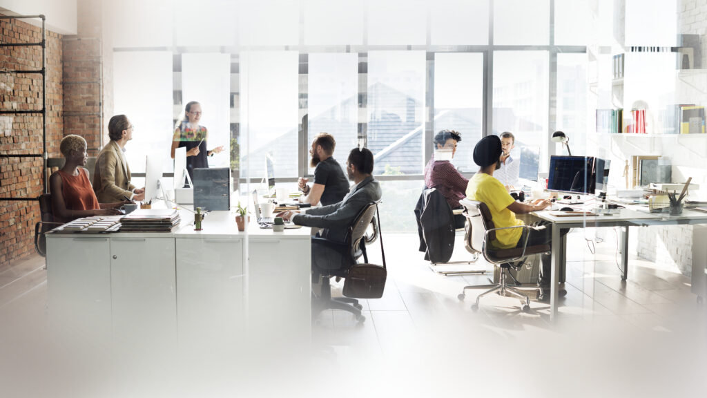 Diverse people in an office discussing the SEC custody rule audit requirement