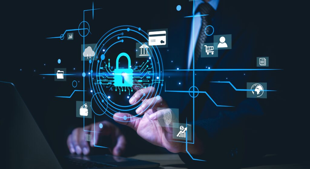 Business professionals reviewing data on a laptop with cyber security and accounting icons overlayed, highlighting data protection efforts.
