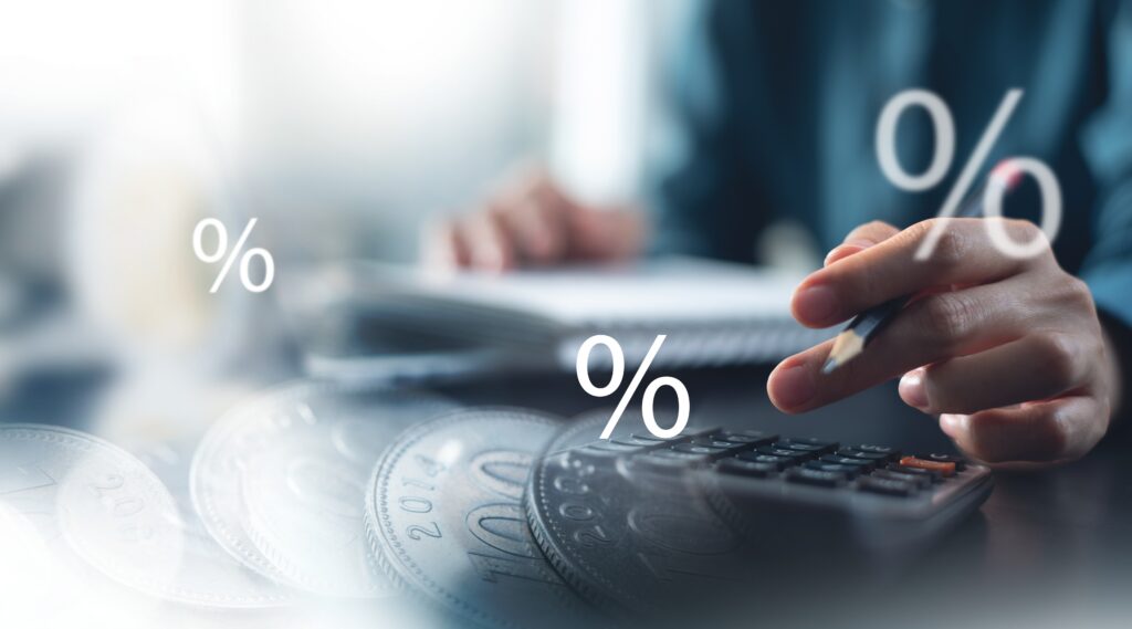 Virtual auditor services support percentage calculations with a calculator, coins, and financial documents.